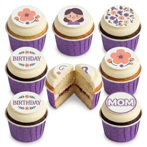 Selection of cupcakes with white frosting and purple wrappers, decorated with floral toppers, a female character, 'BIRTHDAY', 'MOM', and custom initial/age toppers.