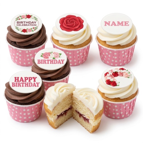 Assorted floral birthday cupcakes with edible flower and message toppers in pink and white wrappers.