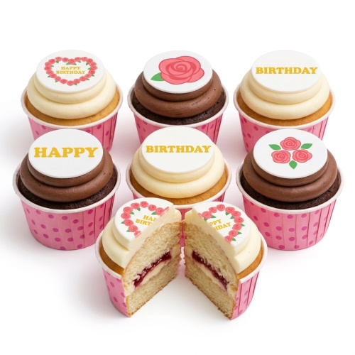 Six cupcakes with 'Happy Birthday' and rose toppers in pink polka dot cases.