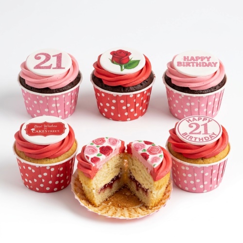 Rose themed birthday cupcakes with pink and red frosting, featuring custom age toppers and 'Happy Birthday' messages.