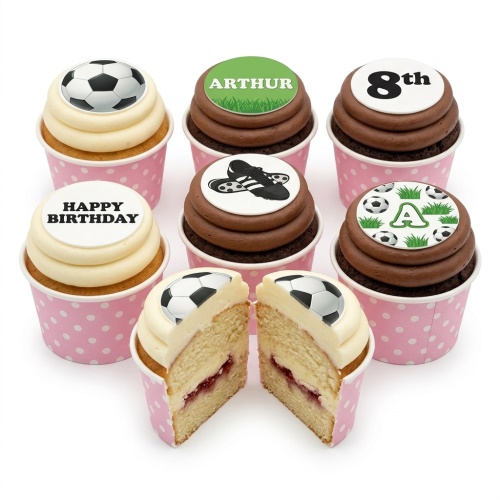 Football themed cupcakes with various edible toppers and pink polka dot cases.