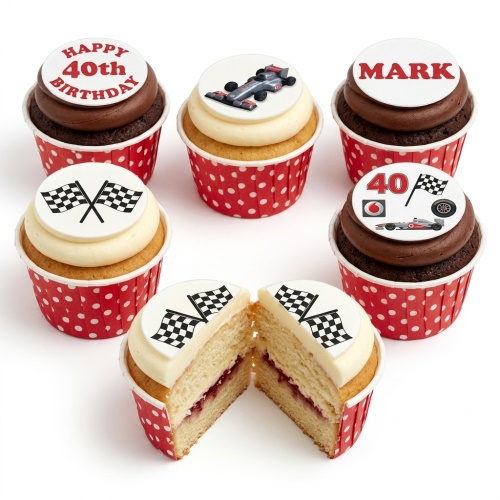 Cupcakes with racing car, checkered flag, and custom age/name toppers in red polka dot cases.