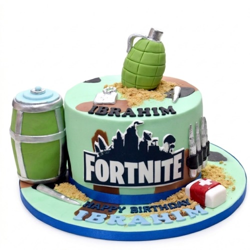 Round green Fortnite themed birthday cake with grenade, ammo, medkit, and personalised name.