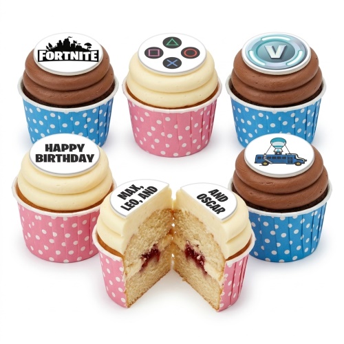 Fortnite and PlayStation themed cupcakes with 'Happy Birthday' and custom name toppers, in pink and blue polka dot wrappers.