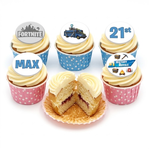 Fortnite themed cupcakes with white frosting, blue and pink polka dot cases, and edible game-related toppers.