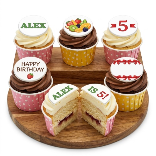 Cupcakes with white and chocolate frosting, fruit topper, and customisable birthday messages.