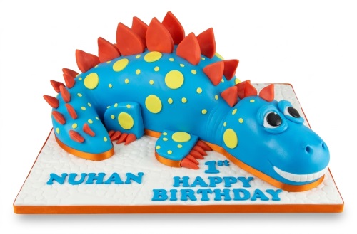 Blue 3D dinosaur birthday cake with orange spikes, yellow spots, and custom name/age.
