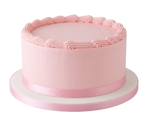 Elegant round pink birthday cake with piped frosting border and pink ribbon.