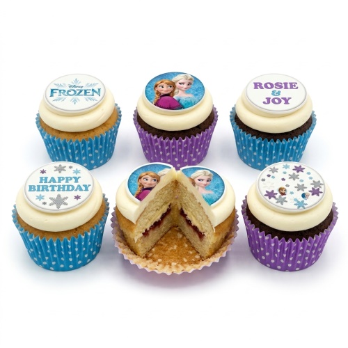 Disney Frozen themed cupcakes with Elsa, Anna, and snowflake toppers in blue and purple wrappers.