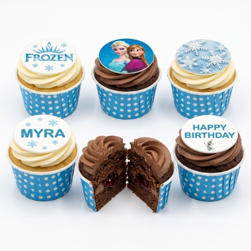 Disney Frozen cupcakes with Elsa, Anna, Olaf, and snowflake toppers in blue polka dot wrappers. Personalised for birthdays.