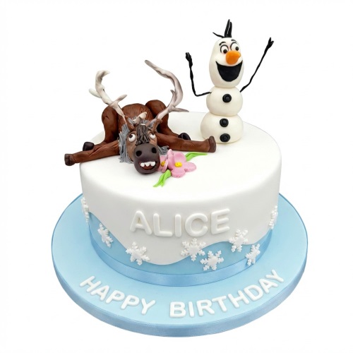 White and blue Frozen themed birthday cake with Olaf and Sven figures, snowflakes, and a personalised name.