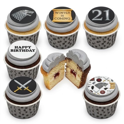 Game of Thrones themed cupcakes with grey frosting, direwolf, 'Winter is Coming' scroll, swords, and custom age topper.