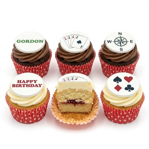 Casino theme cupcakes with playing card aces, card suits, compass, and personalised birthday message toppers.