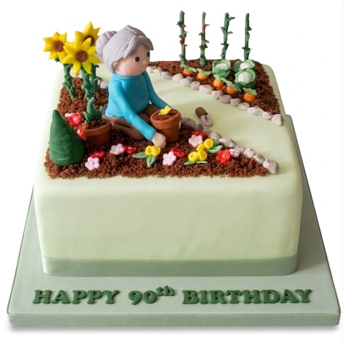 Square light green cake with edible woman gardening, sunflowers, and small flowers.