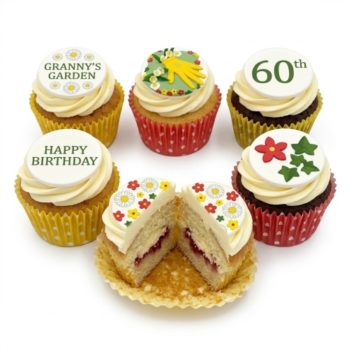 Six cupcakes with white frosting and edible toppers featuring gardening glove, flowers, ivy, and a custom age example.