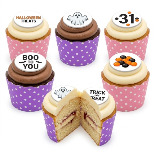 Halloween themed cupcakes with ghost, bat, "Halloween Treats", "Boo to You", "Trick or Treat", and "31" toppers, in pink and purple polka dot wrappers.