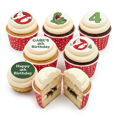 Ghostbusters themed cupcakes with logo, Slimer, and custom age toppers in red polka dot cases.
