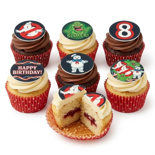 Ghostbusters themed cupcakes with character toppers, including Slimer and Stay Puft, and a custom age topper.