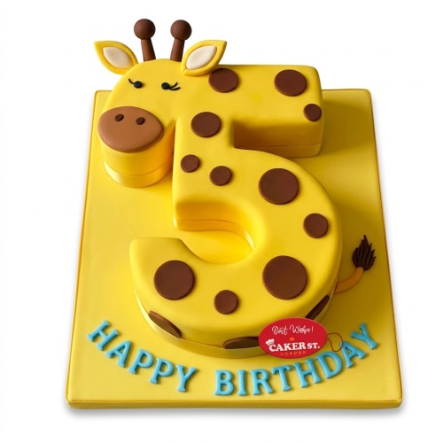 Yellow number 5 birthday cake with a giraffe head, brown spots, and 'Happy Birthday' text