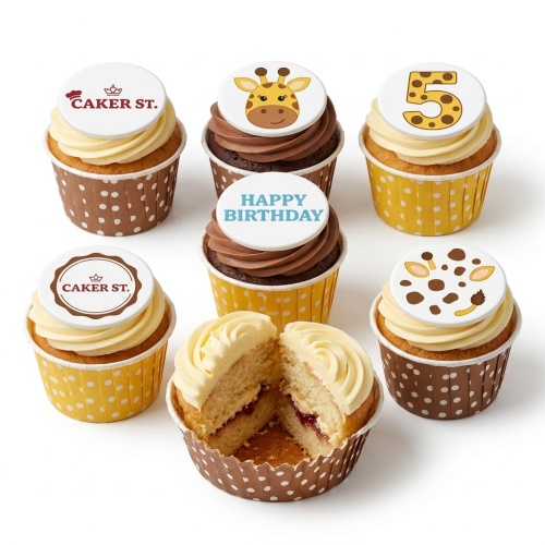 Assorted giraffe themed birthday cupcakes with custom age topper and happy birthday message