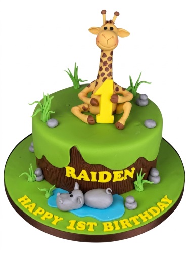 Two-tier jungle safari 1st birthday cake with a 3D giraffe, hippo, and custom name.
