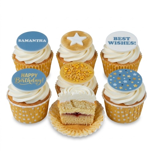 Set of white frosted cupcakes with blue and gold star and sprinkle toppers, in yellow polka dot cases.