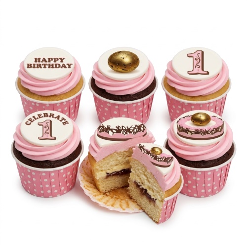 Pink and gold 1st birthday cupcakes with 'Happy Birthday' and 'Celebrate 1' toppers, and gold sphere decorations.