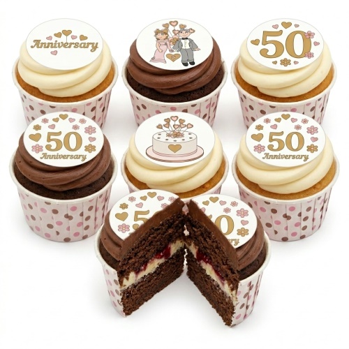 Set of 50th Anniversary cupcakes with gold '50 Anniversary' toppers, a cartoon couple, and a celebration cake design.