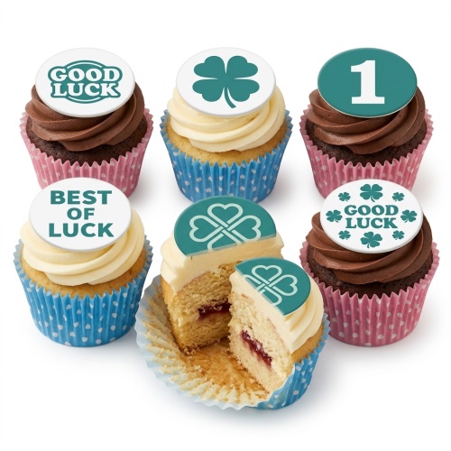 Selection of Good Luck cupcakes with shamrock and 'Good Luck' edible toppers on chocolate and vanilla sponges.