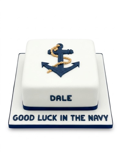 White square cake with a navy blue anchor and rope decoration, with a custom name and good luck message.