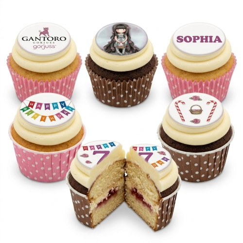 Gorjuss themed cupcakes with character doll, "Happy Birthday" banner, custom name, and age toppers.
