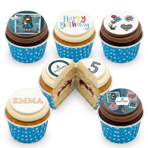 Santoro Gorjuss themed birthday cupcakes with custom name and age toppers, blue polka dot cases, and chocolate and vanilla frosting.
