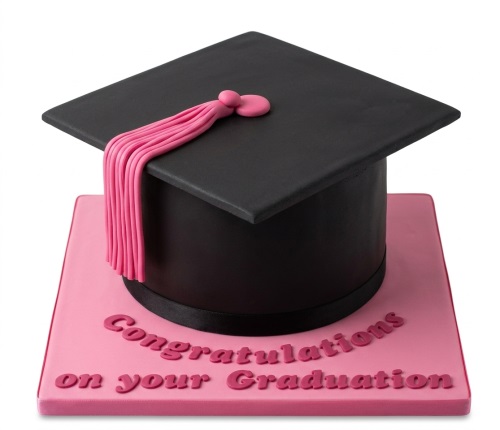 Black graduation cap cake with pink tassel and 'Congratulations on your Graduation' message on a pink board.
