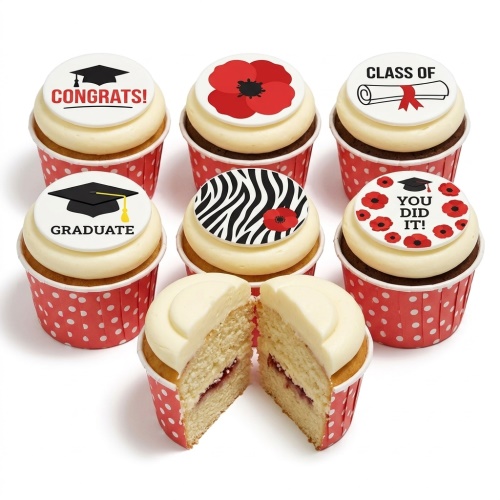 Set of graduation themed cupcakes with white frosting, red polka dot cases, and edible toppers featuring graduation caps, scrolls, poppy flowers, and zebra print.