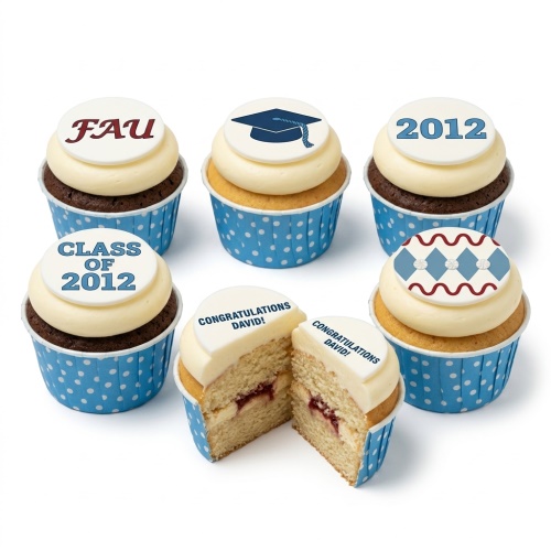 Selection of cupcakes with white frosting and edible toppers, including a graduation cap, university initials, year, and a congratulations message, in blue polka dot cases.