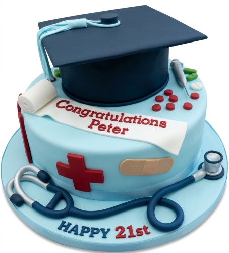 Two-tier light blue cake with dark blue graduation cap, stethoscope, red cross, and medical pills.