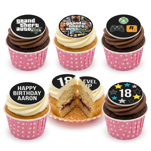 Assortment of gaming theme birthday cupcakes with Grand Theft Auto, Xbox, 'Level Up', and custom age toppers.