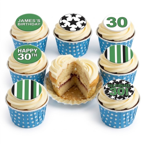 Cupcakes with white frosting, blue polka dot cases, and green, black, and white football and stripe themed edible toppers.
