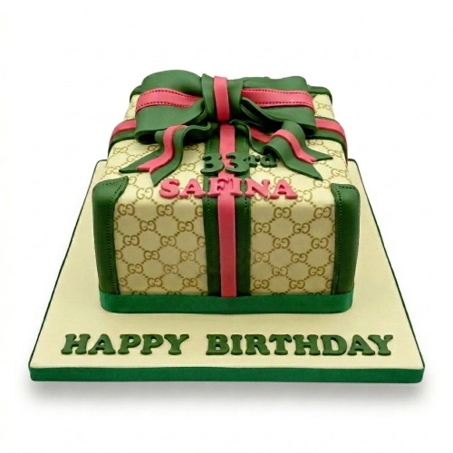 Designer gift box birthday cake for her with green and pink bow, custom age, and personalised name.