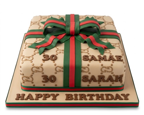 Two-tier Gucci style birthday cake with green and red ribbon, custom age, and name.