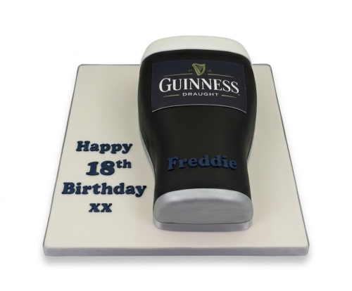 3D Guinness pint shaped birthday cake on a white board with custom age and name