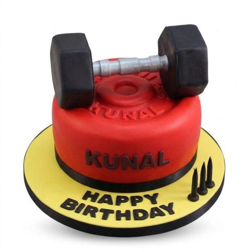 Round red gym theme birthday cake with black dumbbell and personalised name on a yellow board.