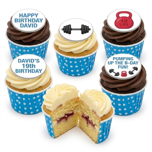 Gym themed birthday cupcakes with barbell and kettlebell toppers, in blue polka dot cases.