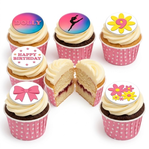 Girls birthday cupcakes with gymnastics, floral, bow, and custom age toppers on pink polka dot wrappers.