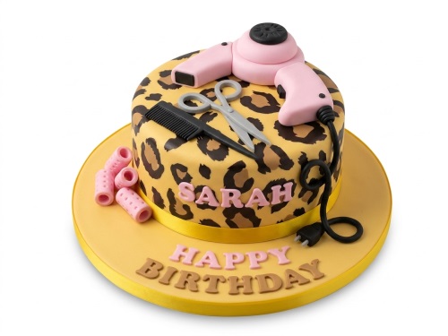 Round leopard print birthday cake with pink hairdryer, comb, scissors, and curlers.