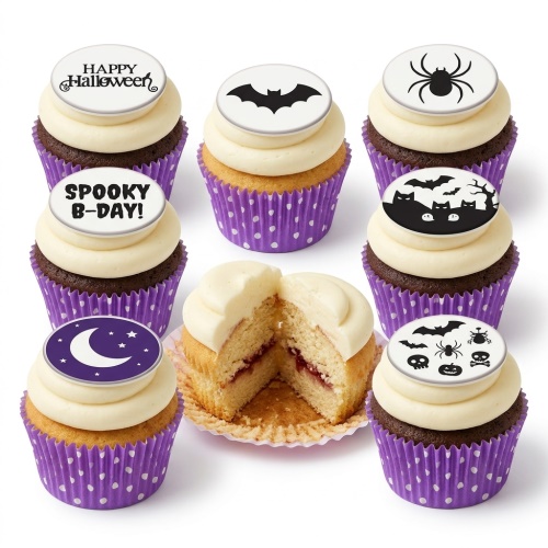 Halloween cupcakes with spooky bat, spider, moon, and skull toppers.