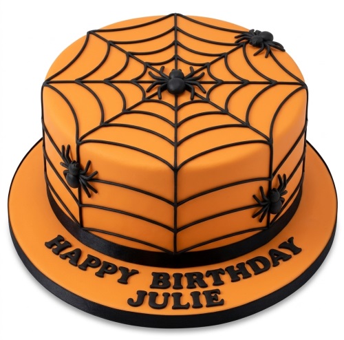 Round orange birthday cake with black spider web design and fondant spiders, ready for personalisation.