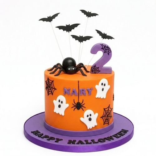 Orange and purple Halloween cake with bats, a large spider, ghosts, spiderwebs, and a custom age topper.