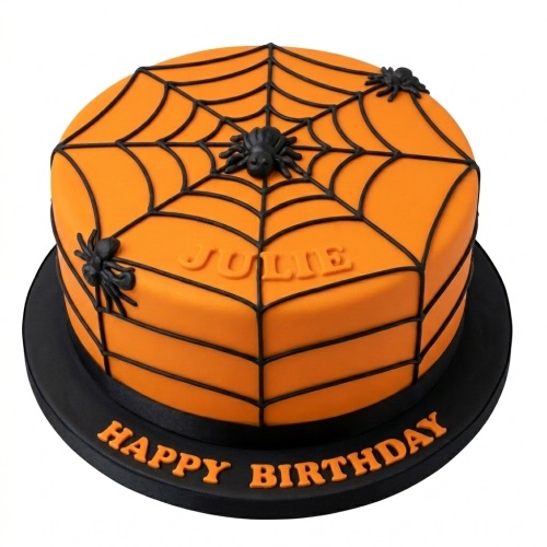 Round orange birthday cake with black spider web design and black fondant spiders on top and sides.