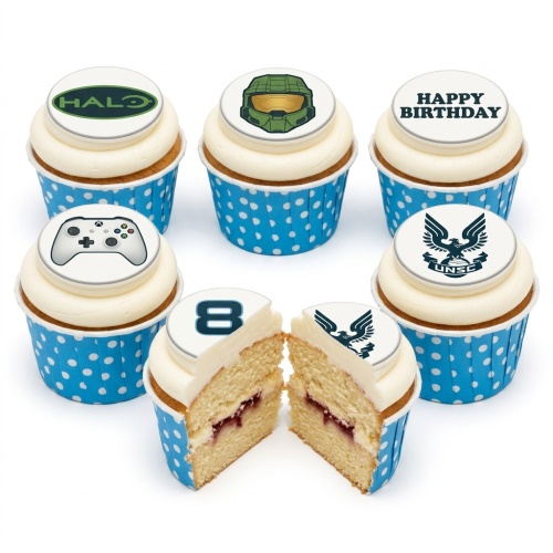 Cupcakes with Halo and Xbox controller toppers, white frosting, and blue polka dot cases, with a custom age number.